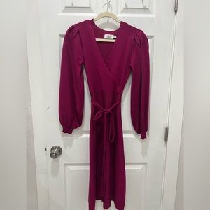Dark pink dress with puffy arms. New without tag. Never worn